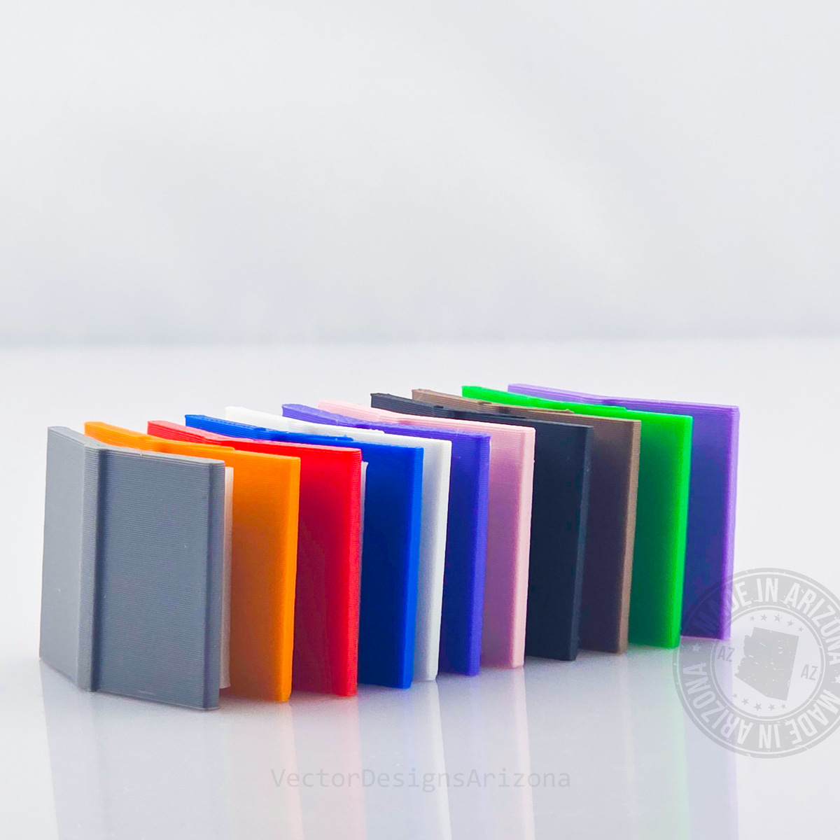 Detachable book color options for Reading Ghost T-Light figurine