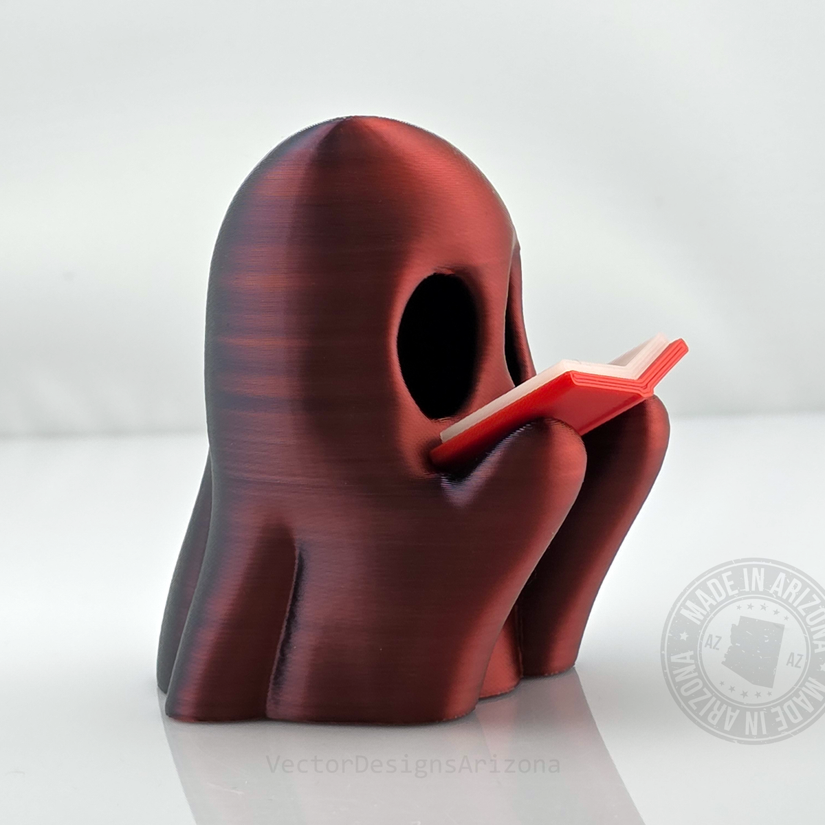Color Shifting Red Reading Ghost T-Light figurine