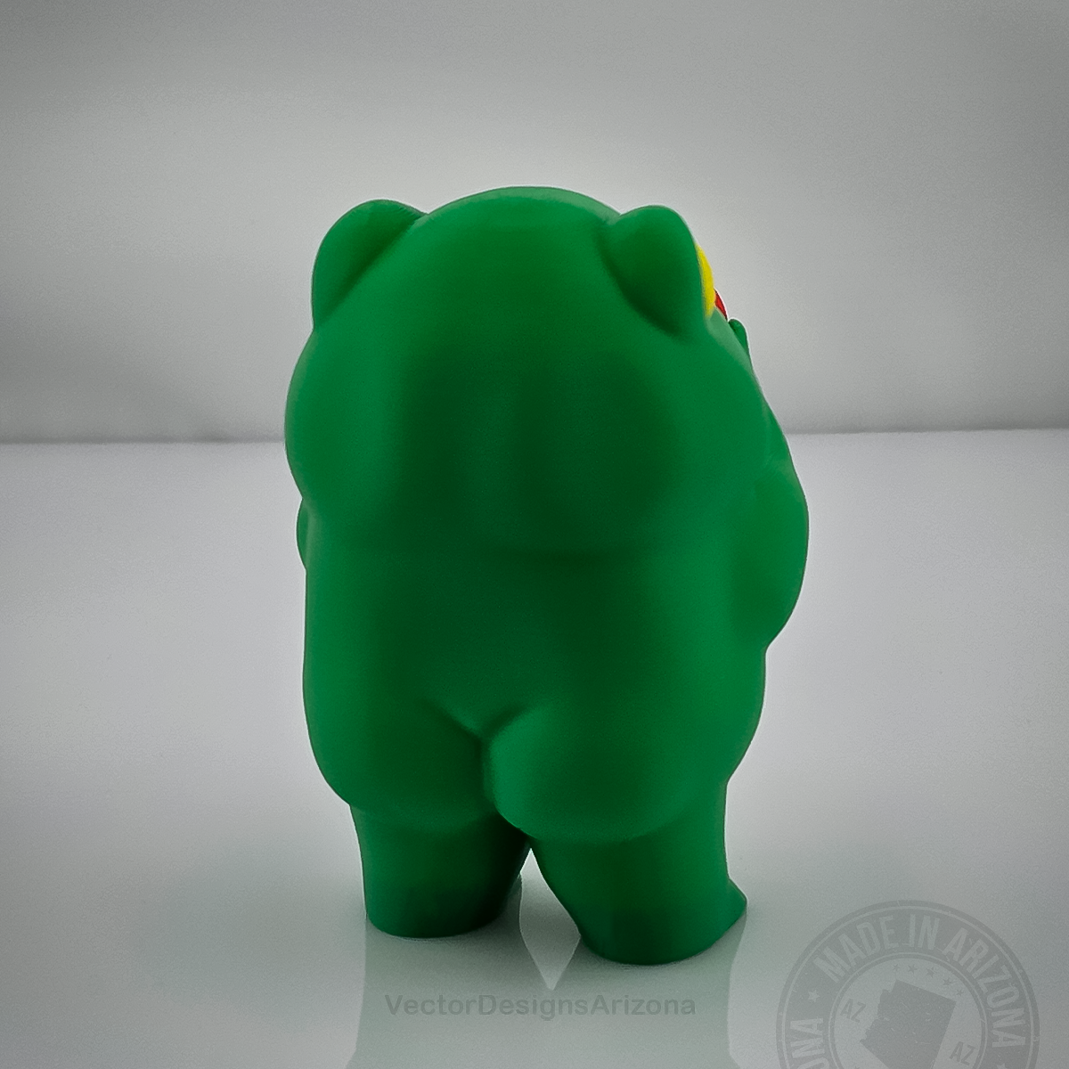 Side view of Love Frog handmade frog figurine for cute desk or shelf decor.