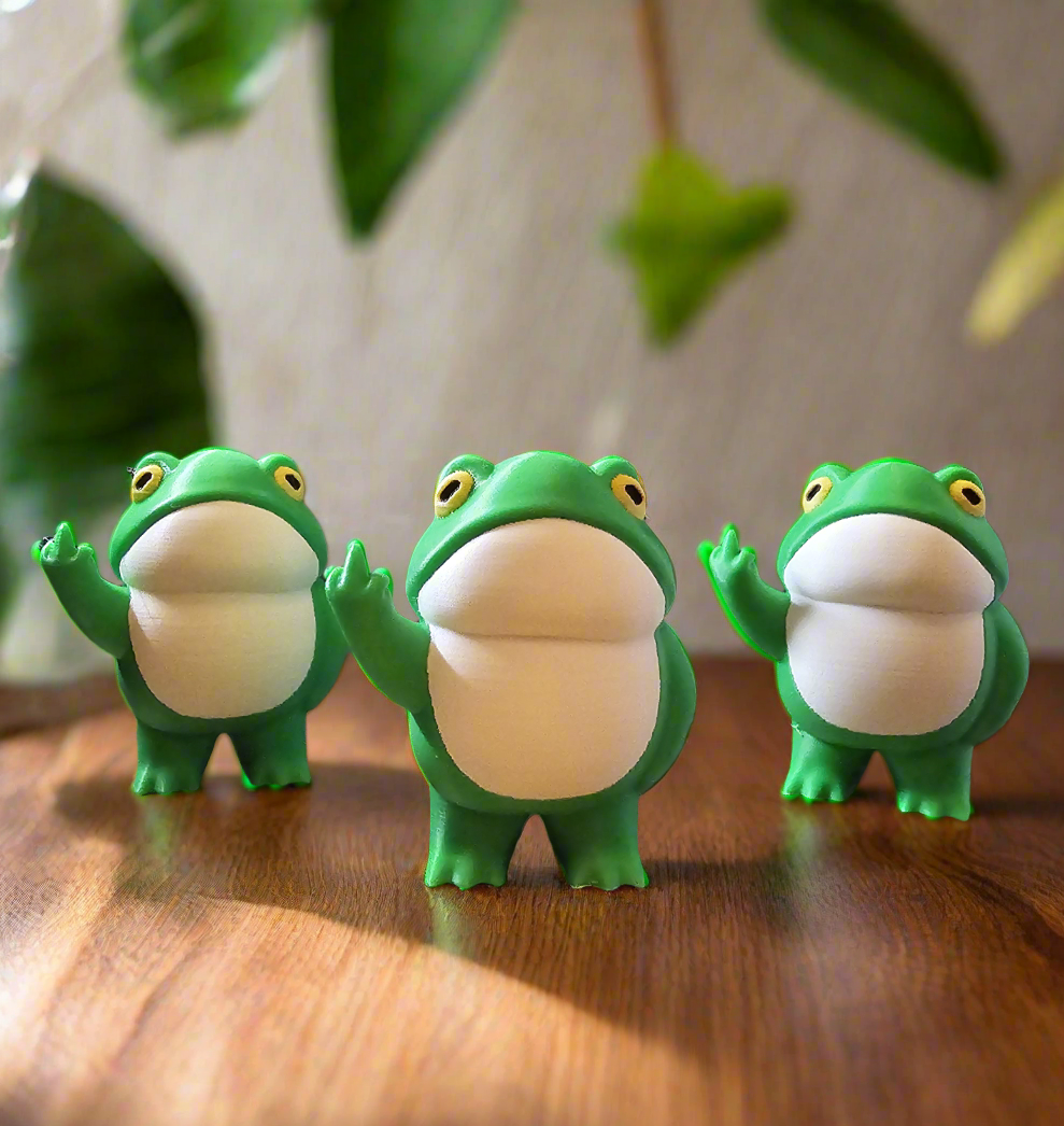 Small and large Disgruntled Frog figurines size comparison