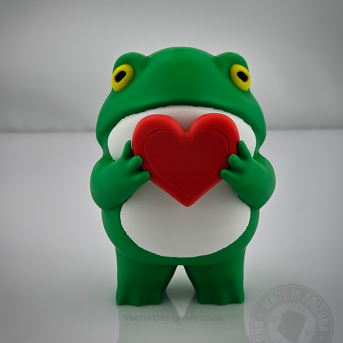 Love Frog figurine product photo showing the cute handmade frog decor by VectorDesignsArizona.