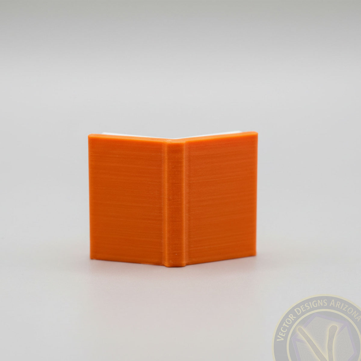 Orange miniature book accessory for Reading Ghost and Grim Reader desk decor