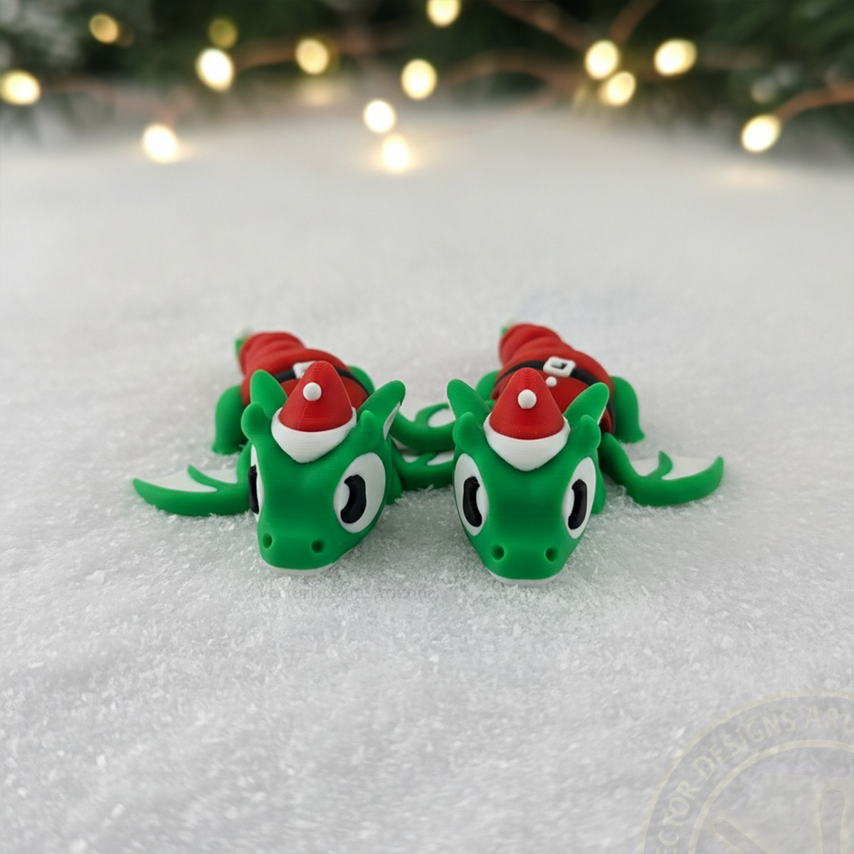 Flexi Reindeer and Elf Dragon 3D printed figurines sitting on snow by VectorDesignsArizona (Vector Designs Arizona)