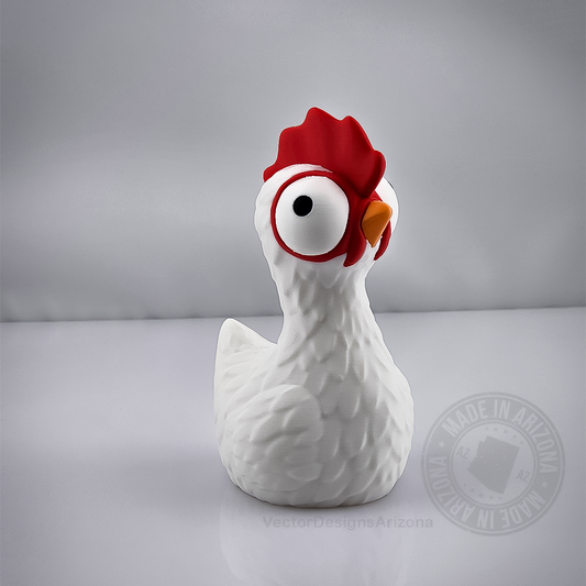 White goofy chicken figurine on light grey studio background with subtle reflection.