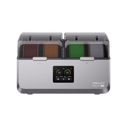 Creality SpacePi X4 in use on desk beside 3D printer showing integrated dry storage and printing workflow