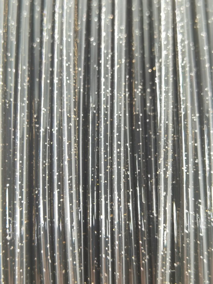Cookiecad Black Star Stuff PLA filament detail – glitter sparkle on black surface
