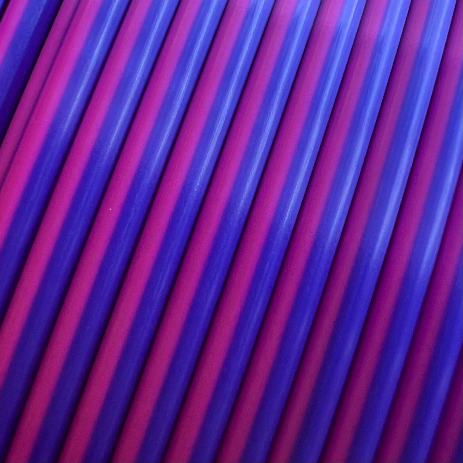 Cookiecad Silk Dual Sunset PLA filament close-up – blue and pink-red silk surface detail