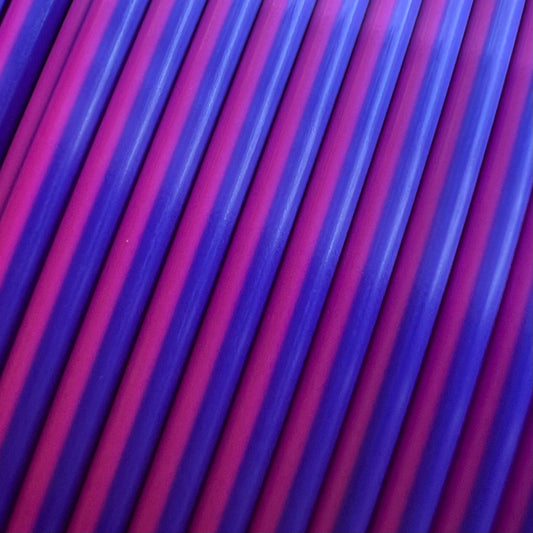 Cookiecad Silk Dual Sunset PLA filament close-up – blue and pink-red silk surface detail
