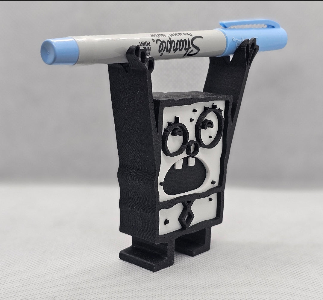 Angled view of Doodle Bob style 3D printed pencil holder holding a gray and blue marker across raised arms