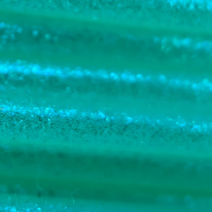Cookiecad Mint Green Elixir TPU 95A filament close-up – blue-green iridescent shimmer detail