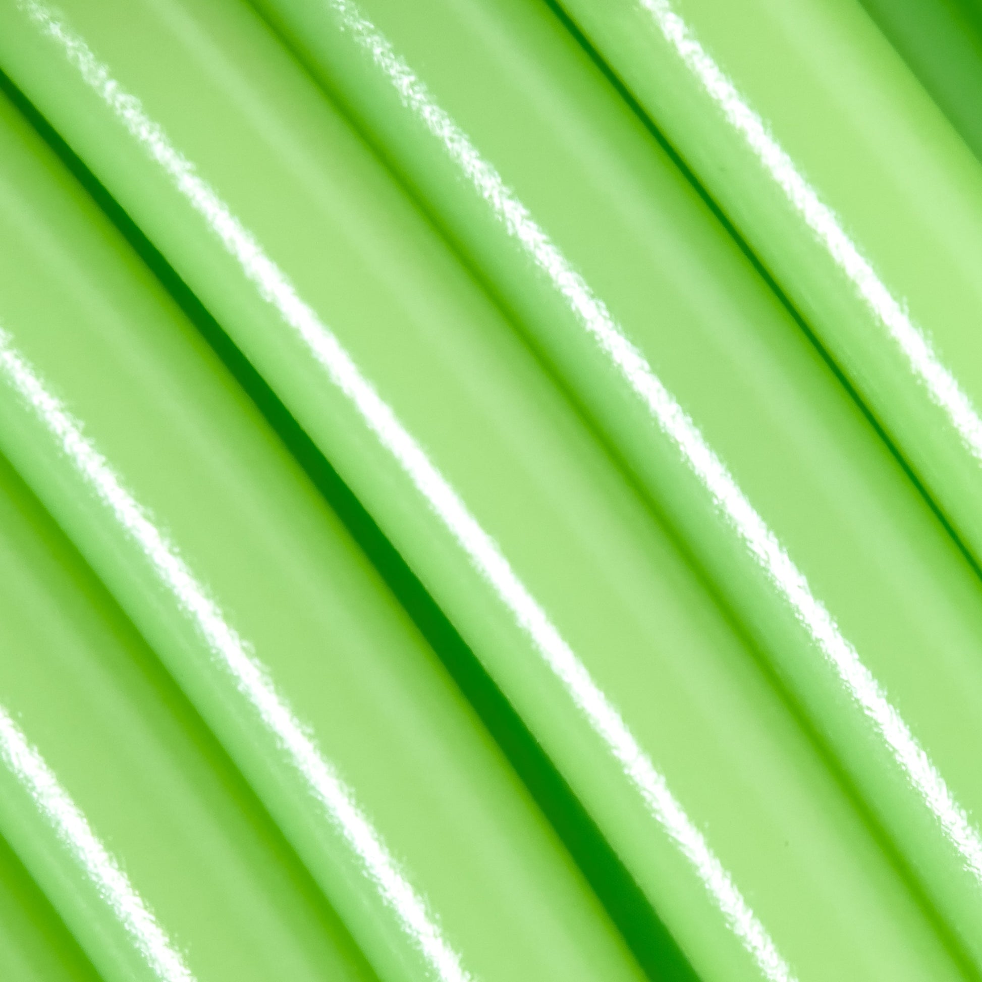 Cookiecad Green Apple PLA filament close-up – vivid green surface detail
