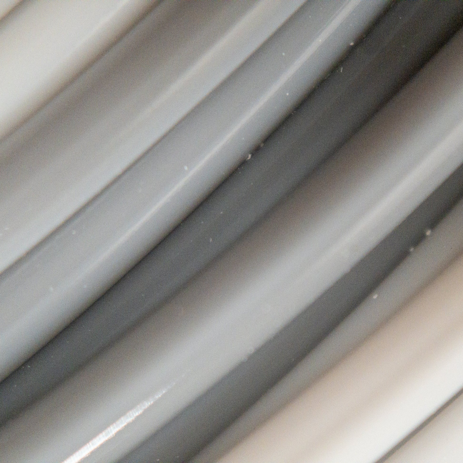 Cookiecad Gray Ombré PLA filament close-up – light to dark gray gradient visible