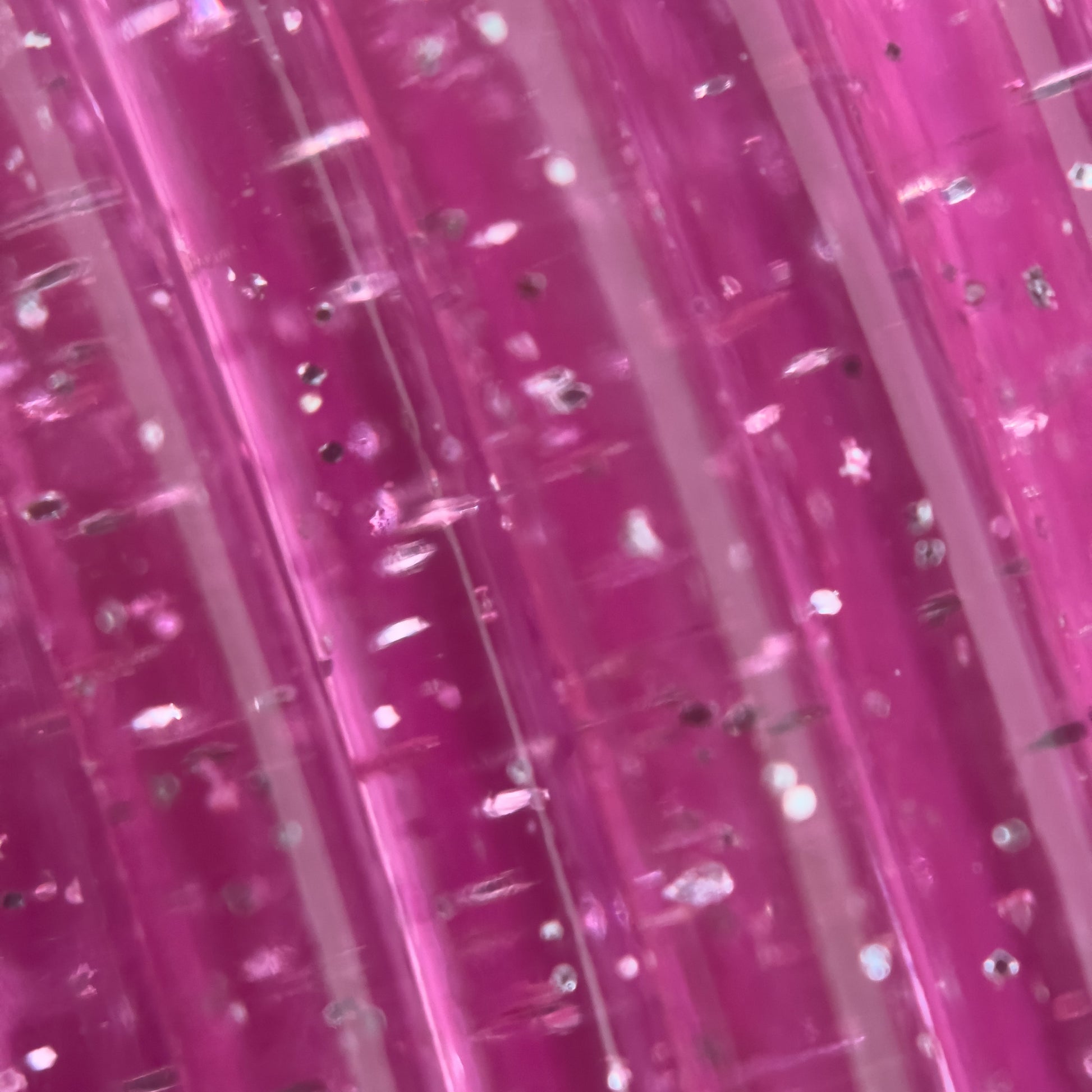 Cookiecad Pink Star Stuff PETG filament close-up – silver glitter in translucent pink base