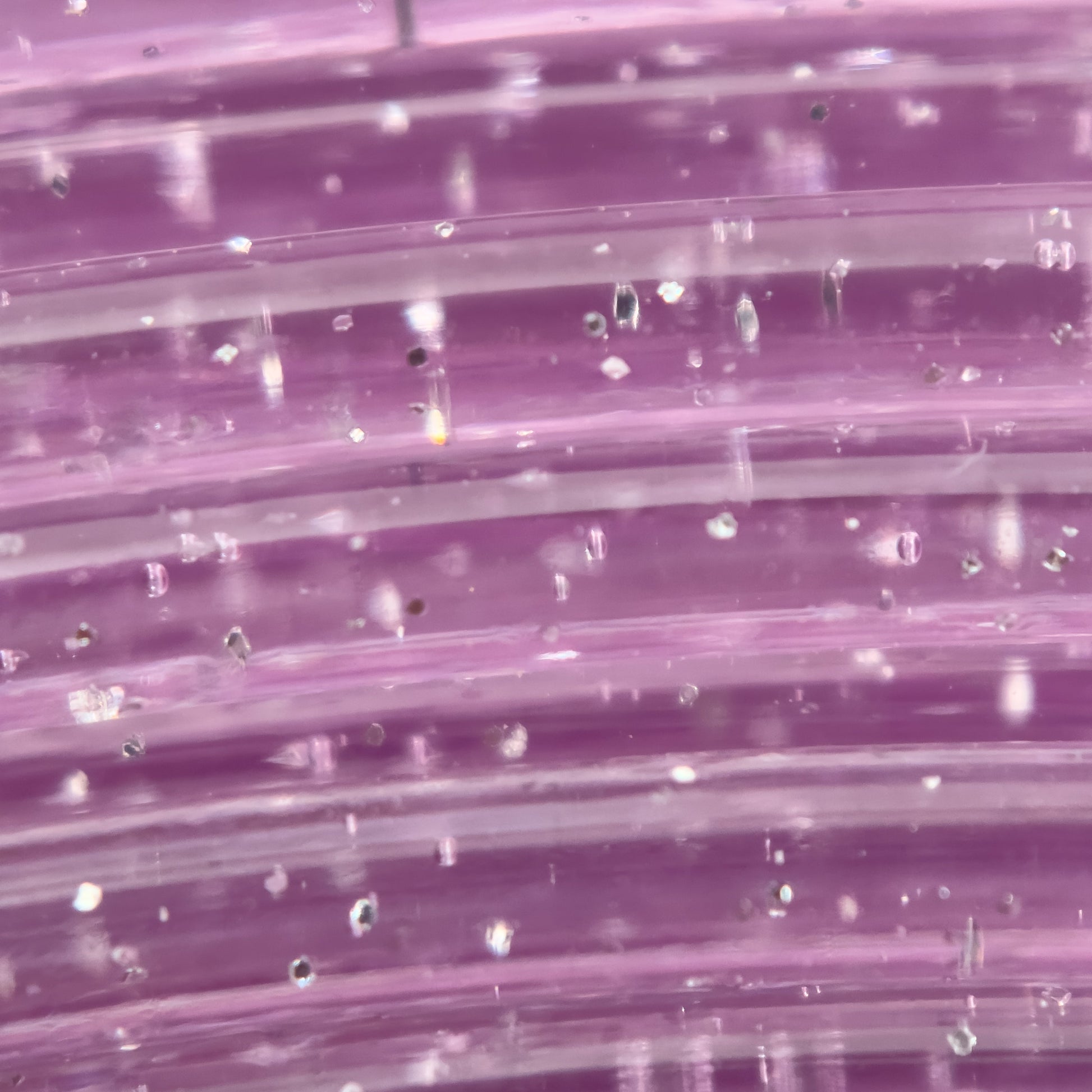 Cookiecad Purple Star Stuff PETG filament close-up – silver glitter in translucent purple base