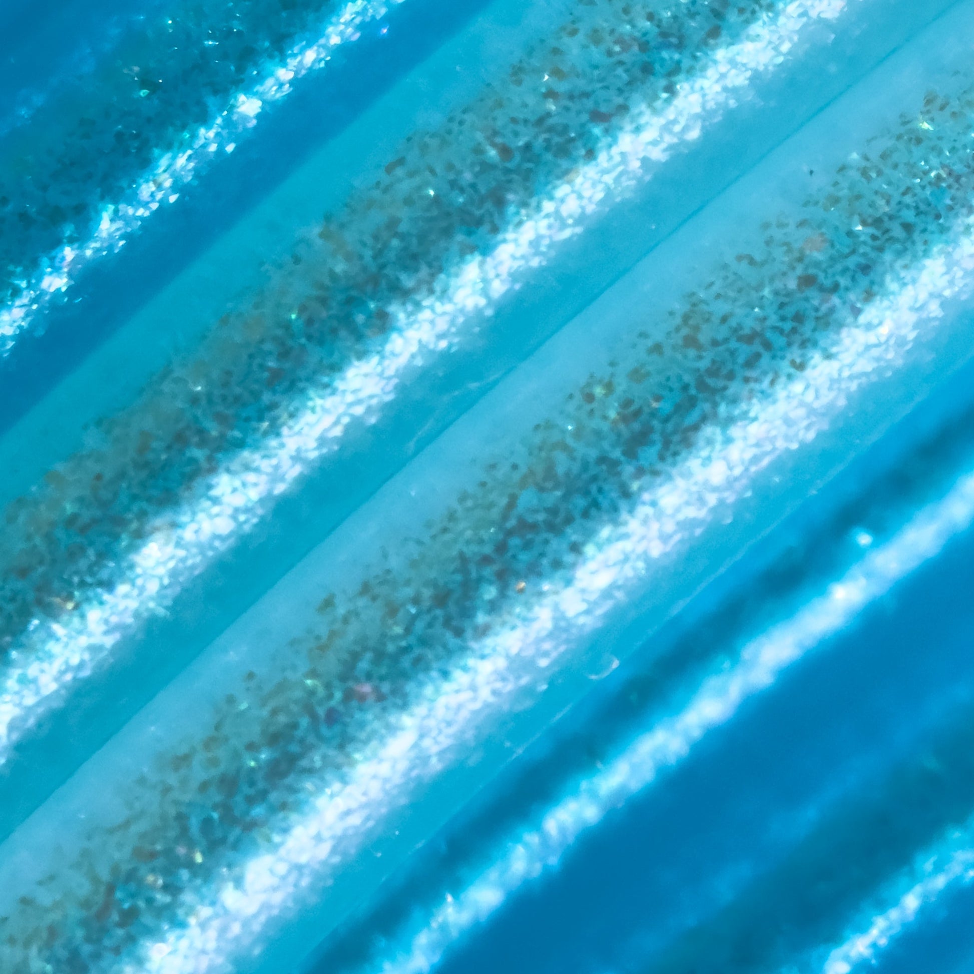 Cookiecad Blue Ombré Elixir PLA filament close-up – iridescent shimmer on blue gradient