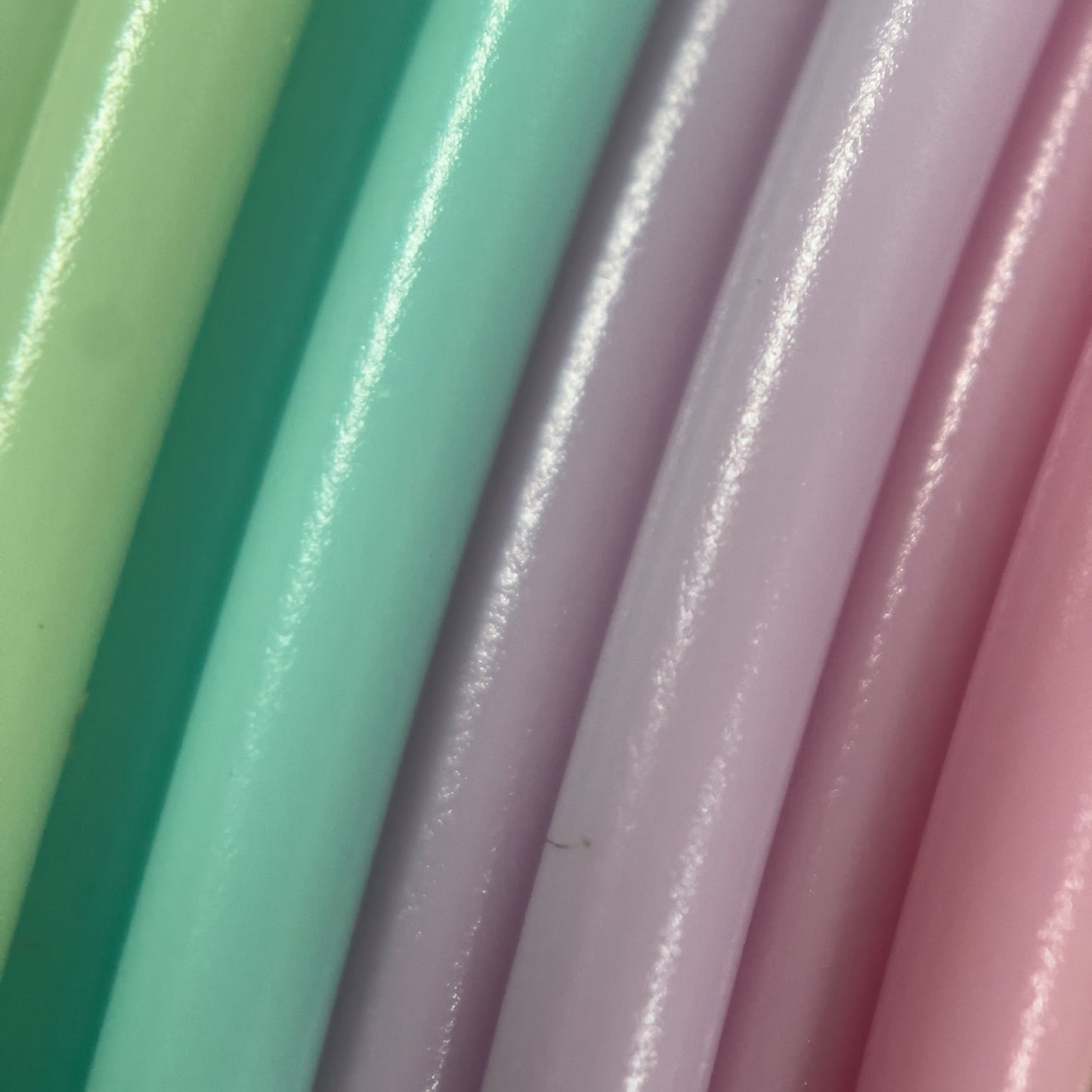 Cookiecad Pastel Rainbow PLA filament close-up – pastel rainbow color zones visible