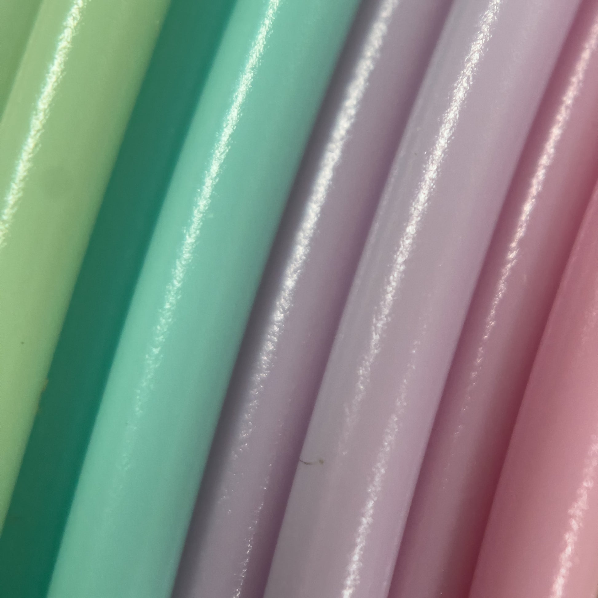 Cookiecad Pastel Rainbow PLA filament close-up – pastel rainbow color zones visible