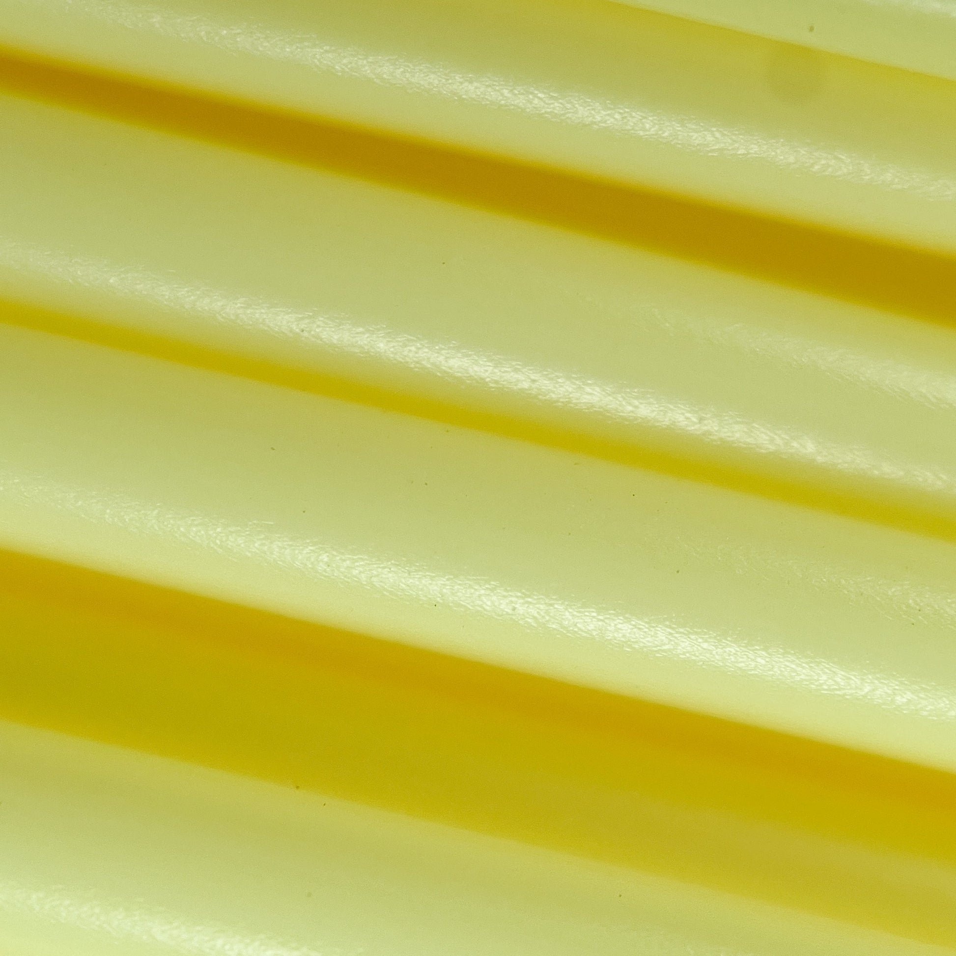 Cookiecad Pale Yellow PLA filament close-up – pastel yellow surface detail
