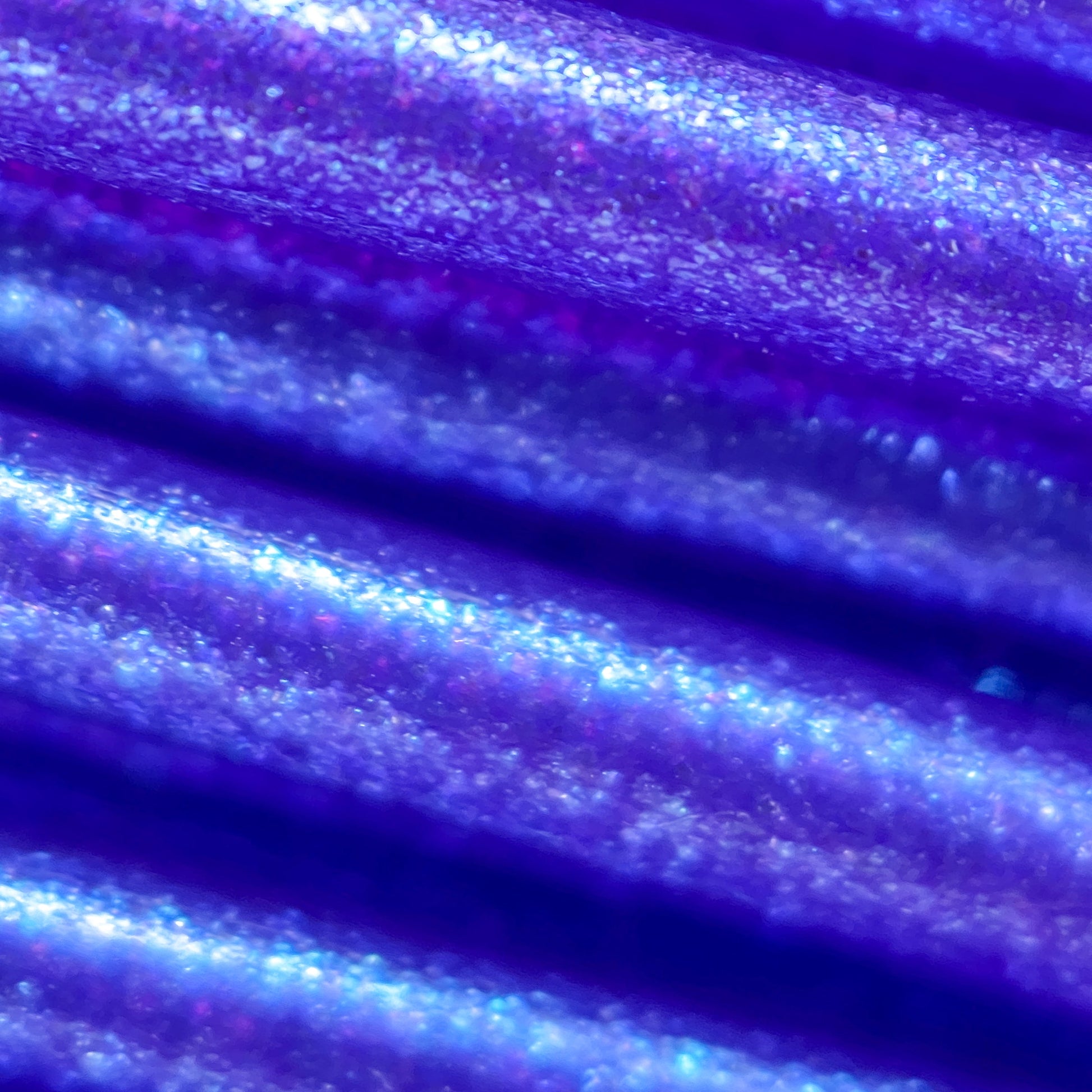 Cookiecad Witches Blue PLA filament detail – color-shifting mica surface