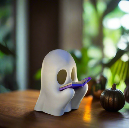 Reading Ghost T‑Light Candle on nightstand with glowing book