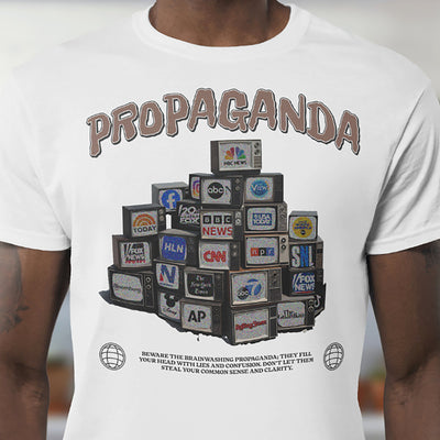 Funny political T-shirt with “Beware the Propaganda” stacked TV design on white Gildan 5000 tee by VectorDesignsArizona.