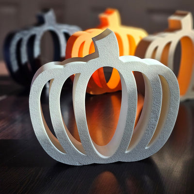 White 3D printed Minimalist Pumpkin silhouette with clean lines and autumn-inspired design by VectorDesignsArizona