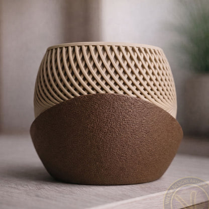 Side angle view of a modern geometric 3D printed planter with a woven pattern pot and textured brown base.