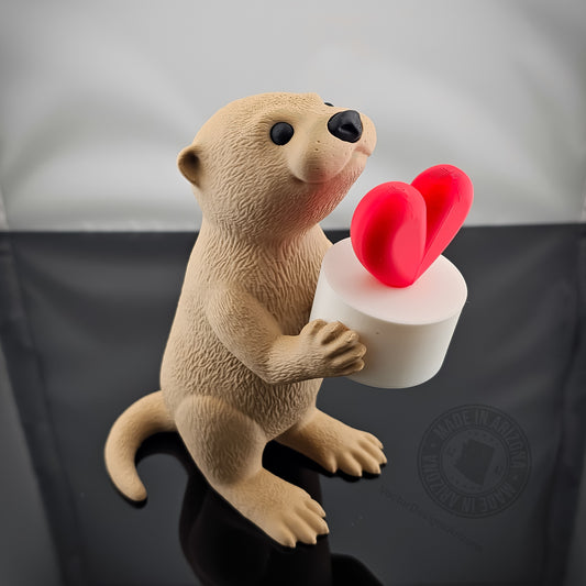 Otterly in Love LED light-up otter couple figurine glowing on display