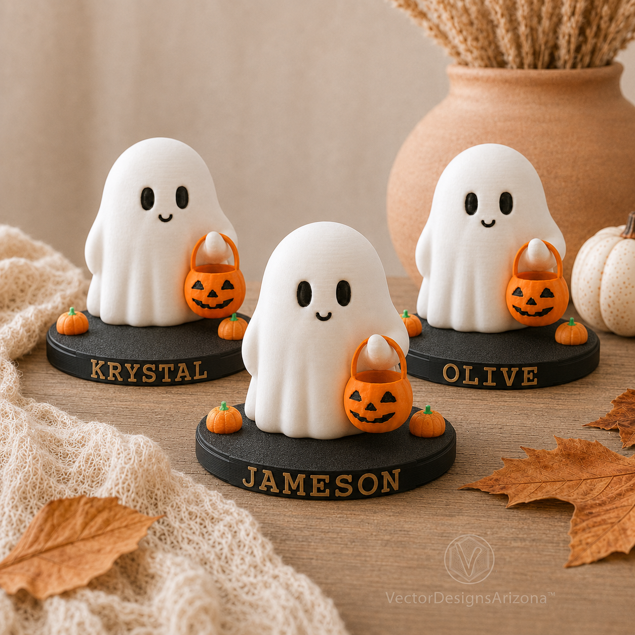 Three Trick-or-Treat Ghost figurines on personalized stands labeled Krystal, Jameson, and Olive.
