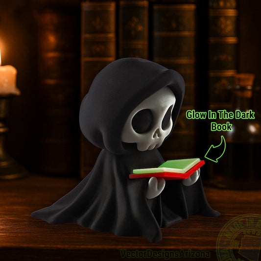 Cute Grim Reaper figurine holding a glow in the dark book, gothic Halloween bookshelf decor with candlelight and potion bottles in the background.
