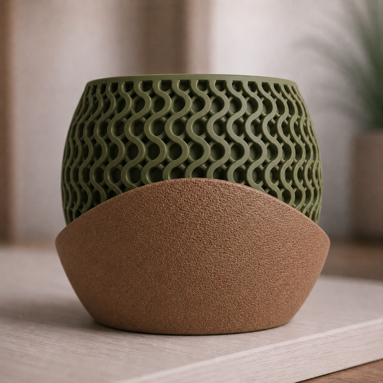 Front view of the olive green Solara Wave Planter with latte brown curved drip tray on a modern shelf.
