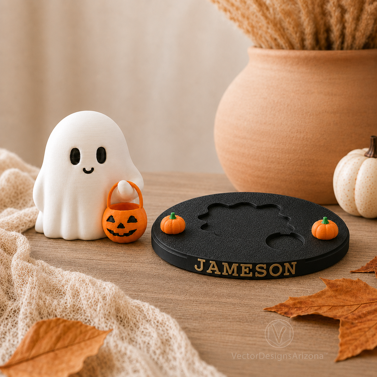 Trick-or-Treat Ghost beside a personalized black display stand showing the molded fitted recess and Jameson name.