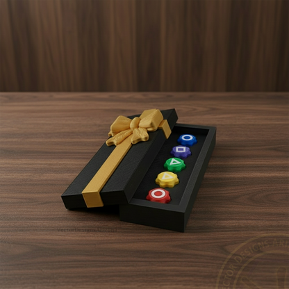 VectorDesignsArizona 3D printed gonggi game gift box with gold ribbon, open on walnut table with rainbow gonggi pieces
