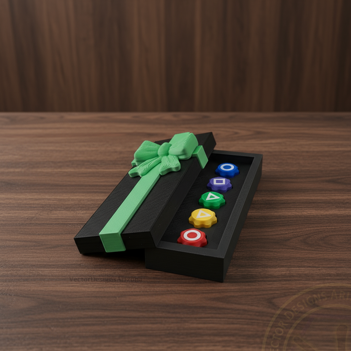VectorDesignsArizona 3D printed gonggi game gift box with green ribbon, open on a dark walnut table.