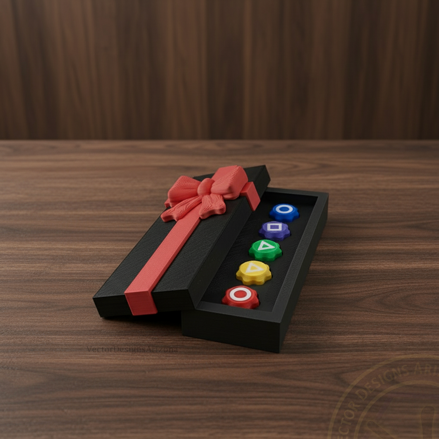 VectorDesignsArizona 3D printed gonggi game gift box with red ribbon, open on a dark walnut table.