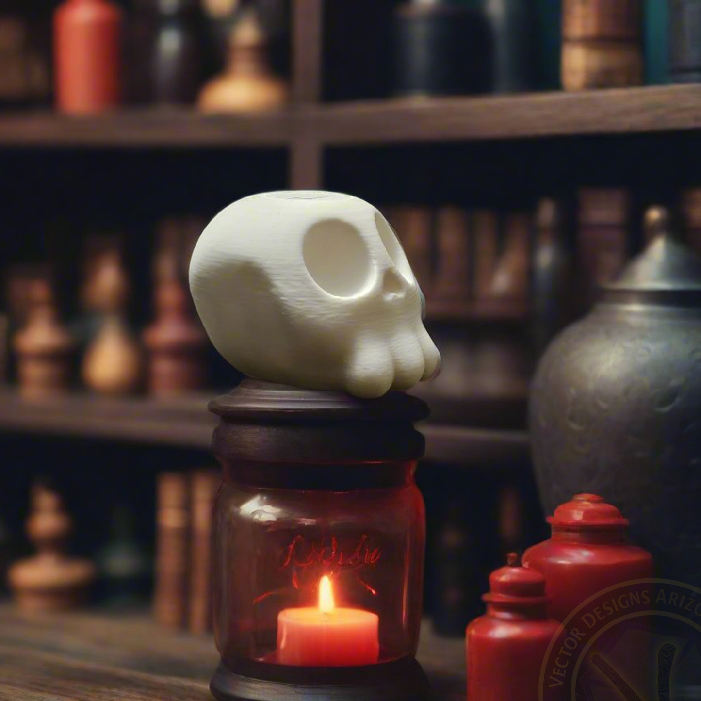White cartoon skull figurine on glass jar above lit candle in spooky room.