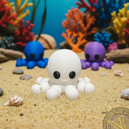 White flexi octopus toy on sandy seabed with blue and purple octopus and colorful coral.