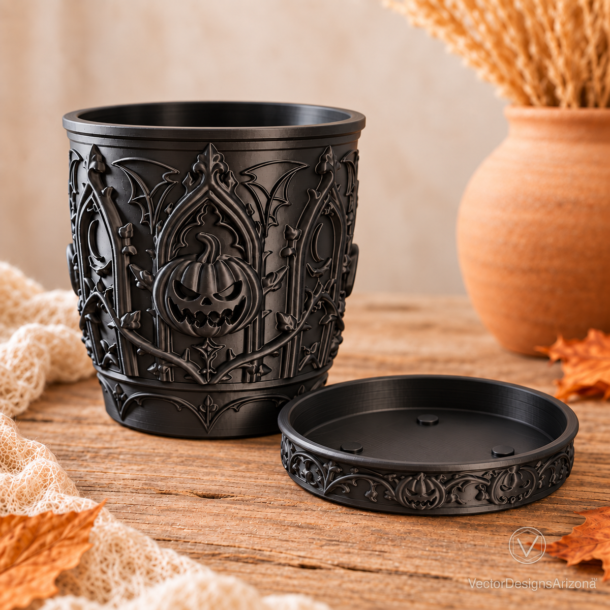 Gothic Pumpkin planter and matching removable saucer shown separately, with the saucer interior visible.