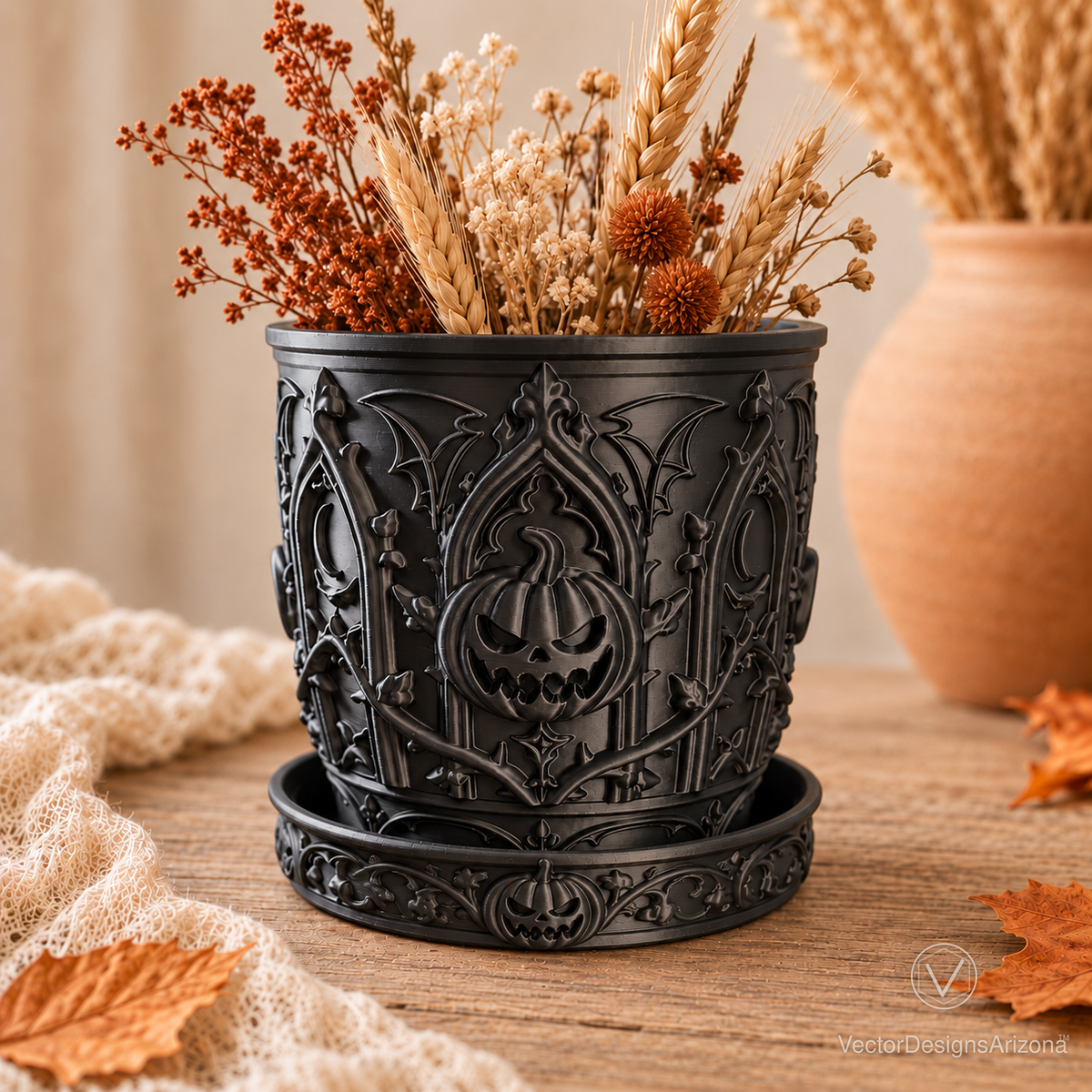 Gothic Pumpkin planter and saucer styled with dried flowers and wheat; botanicals are not included.