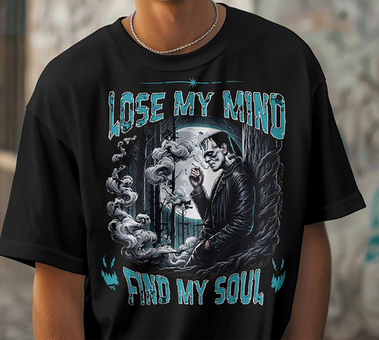 Black T-shirt with Lose My Mind Find My Soul eerie forest graphic.