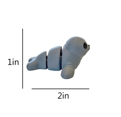 Side view of mini flexy seal toy with 1 inch tall and 2 inch long measurements.