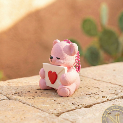Side profile of a pink Valentine bear backpack accessory holding a heart envelope, captured in natural lighting.