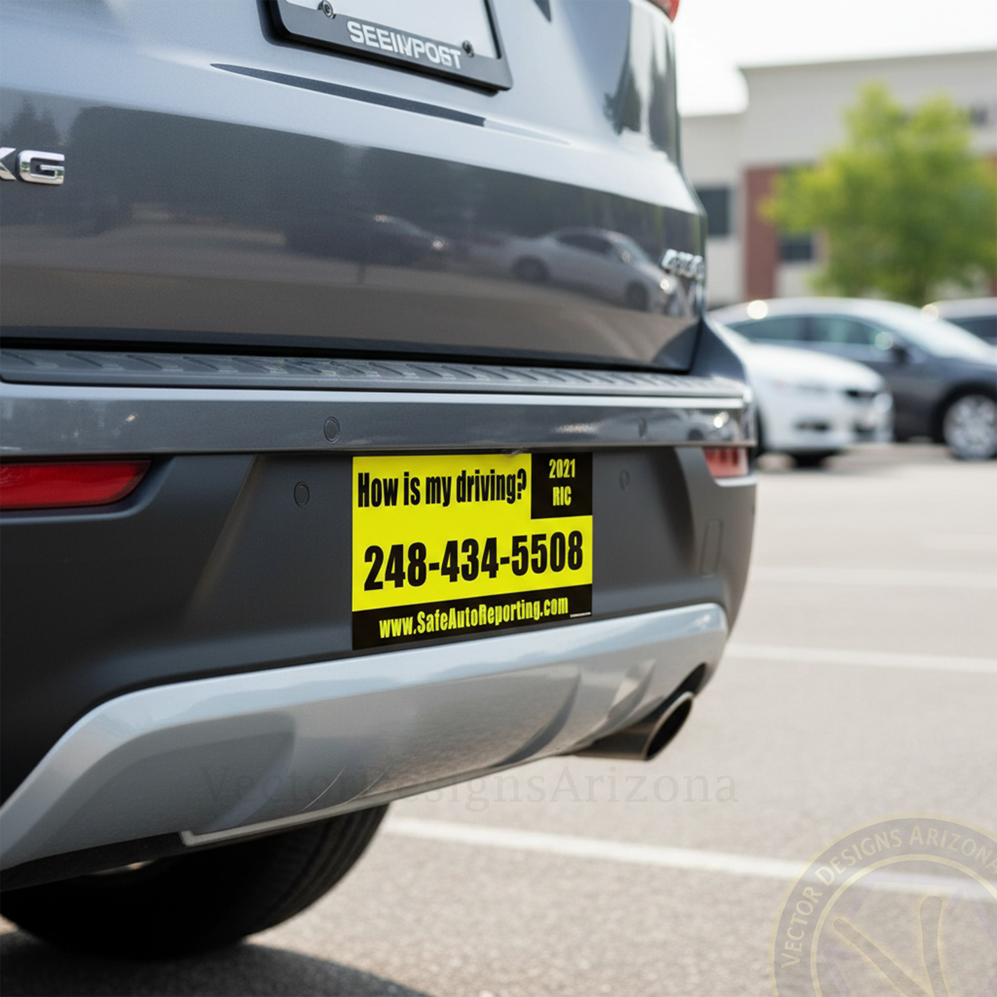 Yellow “How is my driving?” bumper sticker on SUV in parking lot.