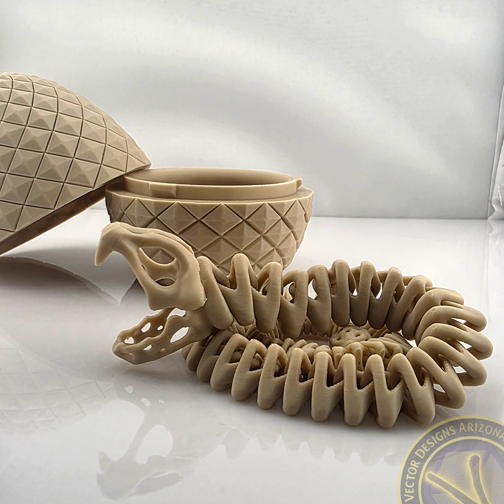 Coiled flexy skeleton dragon in front of open textured egg on glossy surface.