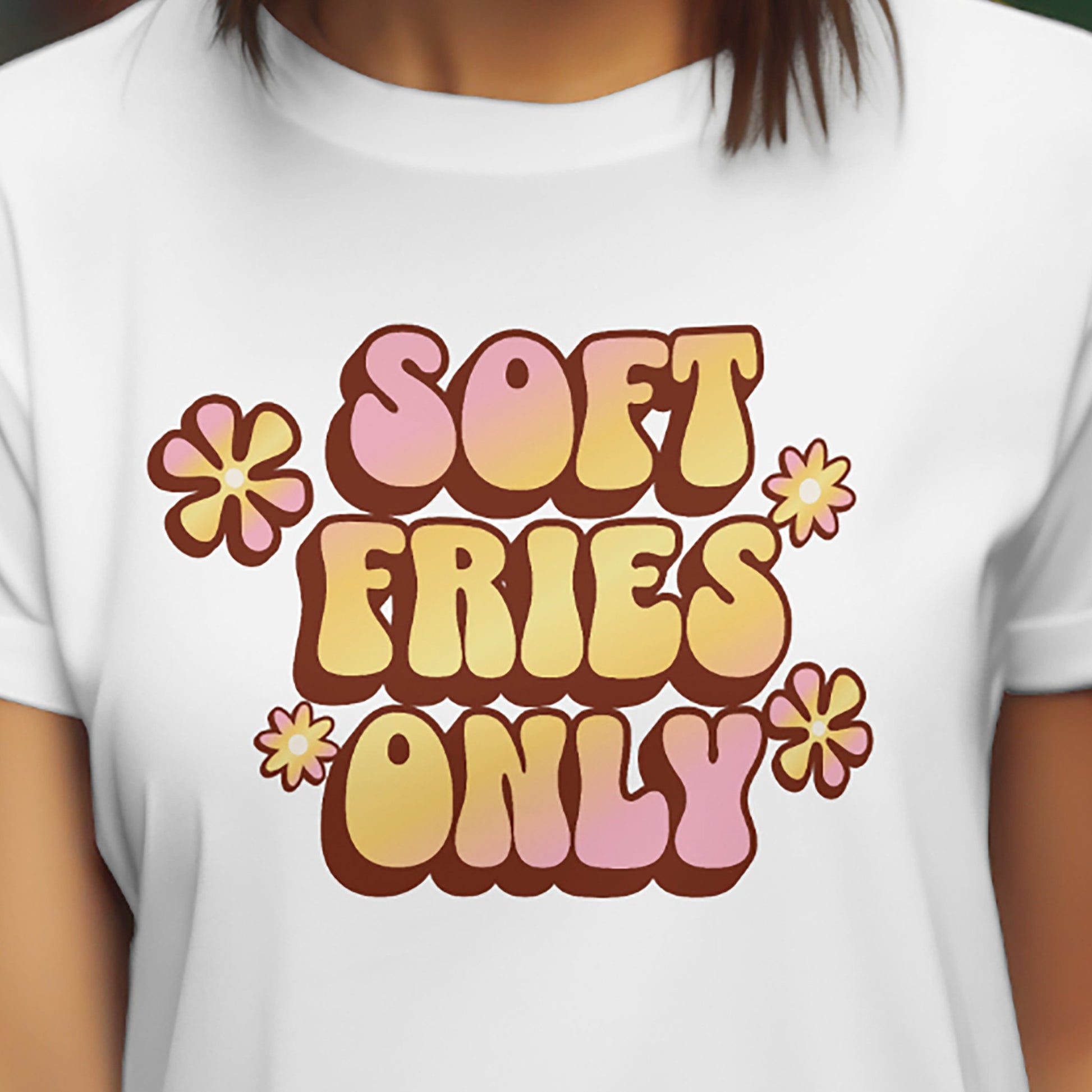 Close-up of Soft Fries Only retro pastel text design on white T-shirt.