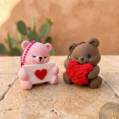 Southwest style 3D printed Valentine bear keychains, usable as cute bag charms, displayed with a prickly pear cactus background.