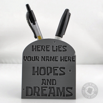Gray tombstone desk pen holder with customizable hopes and dreams engraving.
