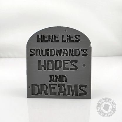 Gray Squid-ward’s hopes and dreams tombstone desk sign on clean white background.